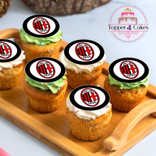 Cupcakes decorated with the AC Milan logo on frosting are displayed on a wooden tray. Among them is an Edible Liverpool Cupcake Topper Personalised, adding a distinct flair. In the background, the Topper 4 Cakes logo can be seen, featuring a cake design.