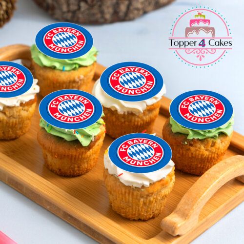 Six cream-frosted cupcakes, each topped with the FC Bayern München logo, are displayed on a wooden tray. A Topper 4 Cakes logo is in the background, highlighting their expertise in crafting personalized delights such as the Edible Liverpool Cupcake Topper Personalised for any occasion.