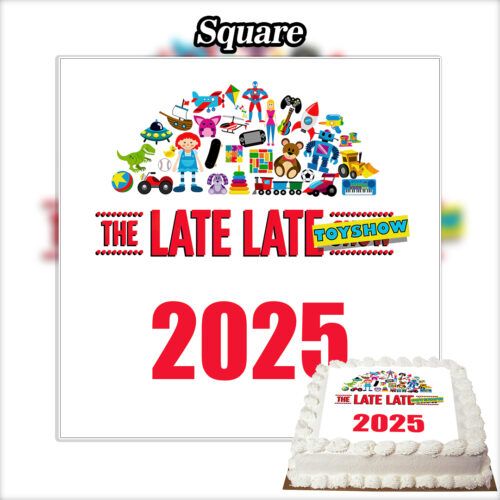 A white cake topped with the Edible The Late Late Toy Show Cake Topper, featuring colorful text and toy images inspired by the 2025 Christmas edition of Ireland's beloved TV show.