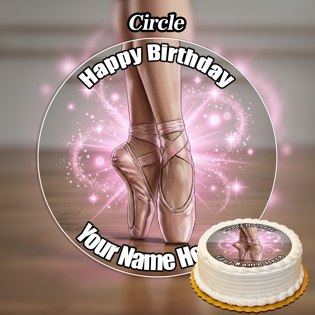 Round birthday cake featuring the Edible Ballerina Cake Topper with ballet pointe shoes and pink sparkles. "Happy Birthday" and your name appear in white letters curved around the cake's edge.