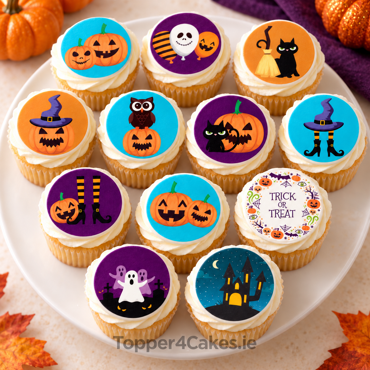 Twelve cupcakes topped with Halloween Edible Cupcake Toppers – 12 Spooky Designs, featuring pumpkins, witches, black cats, ghosts, and “Trick or Treat” for a festive touch.